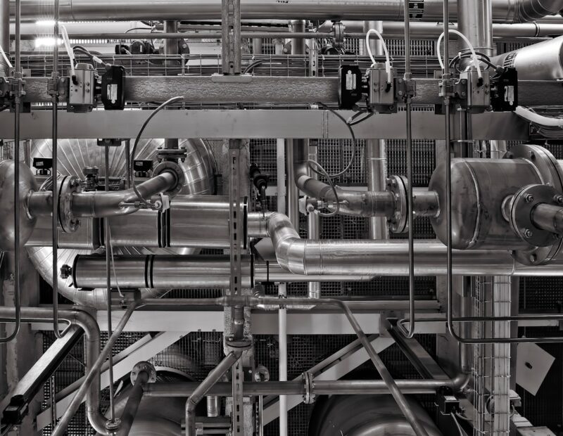 stainless steel and red industrial machine